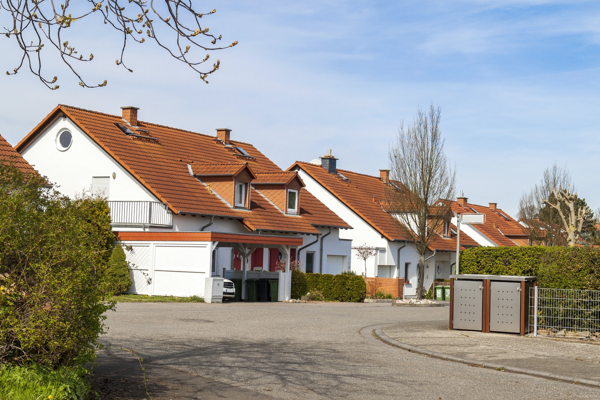 Classic german residential houses with orange roofing tiles and windows